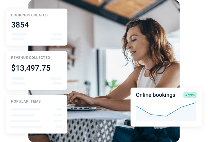 a woman sitting in front of a computer screen