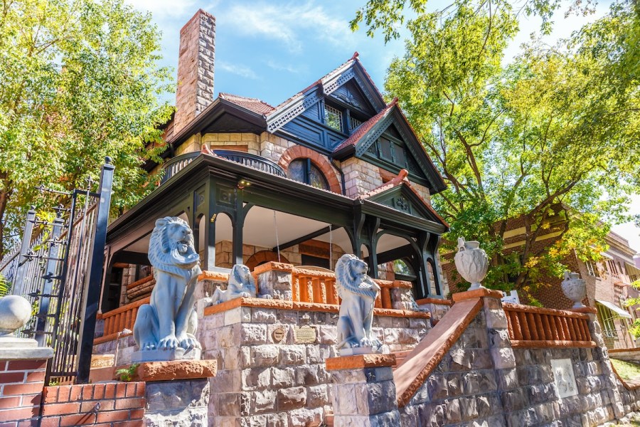 a group of people standing in front of a building